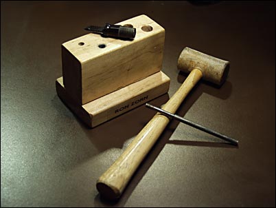 Knockout block, punch, and hammer